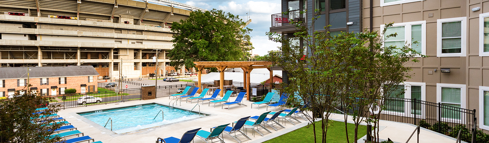 Resort style pool with a view of the stadium
